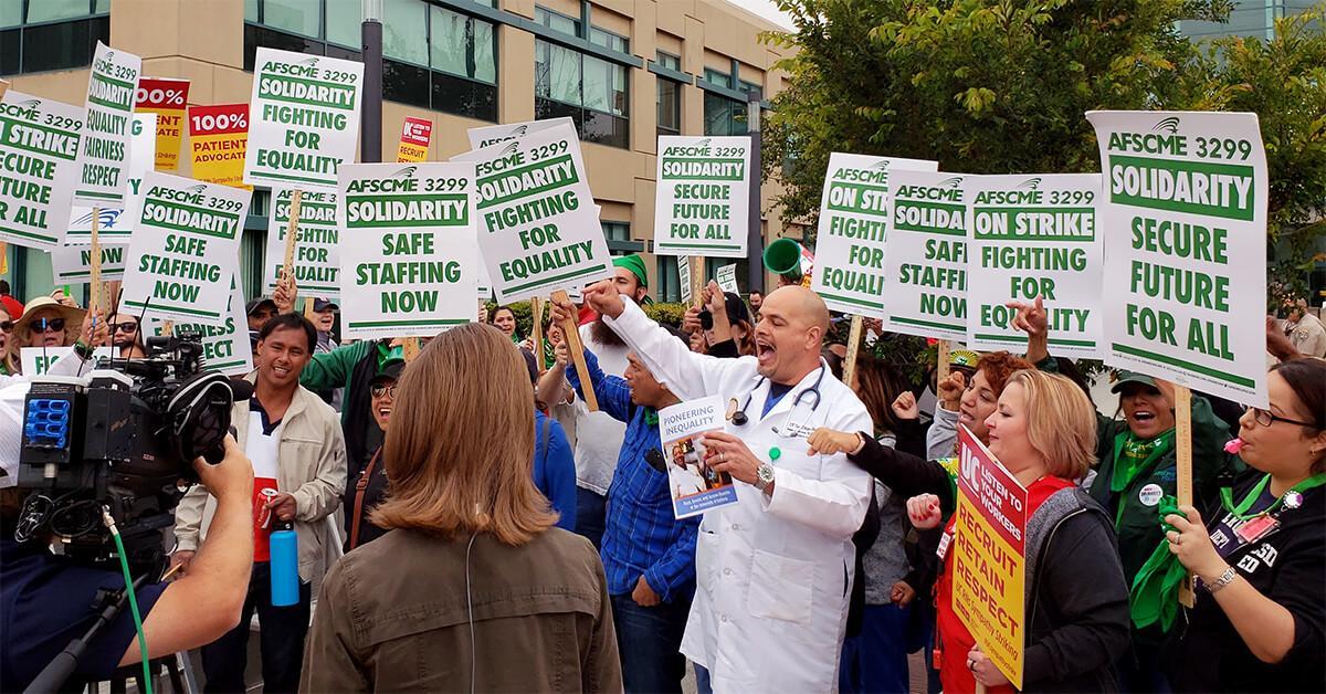 AFSCME 3299 On Strike and Fighting for Equality Isaac Zamora, a respiratory therapist at University of California-San Diego, addresses a crowd of striking UC workers.